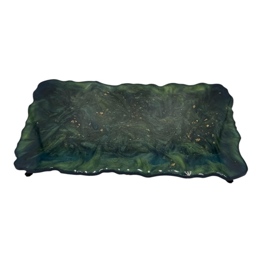 A blue and green resin serving dish on a white background.