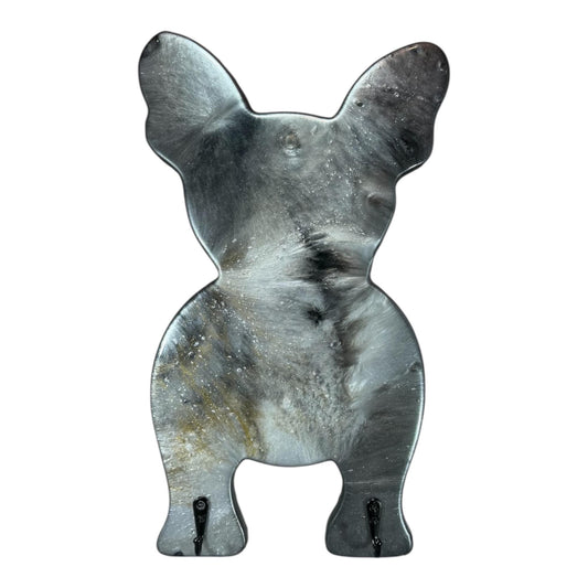 Metallic and grey swirled resin wall decor in a bulldog shape on a white background.