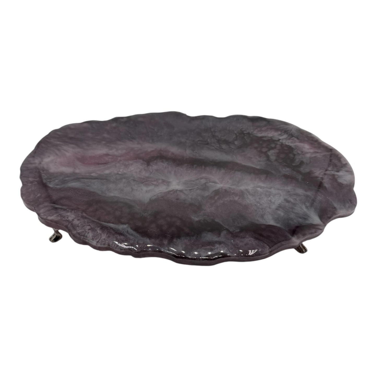 A purple, ovan resin decorative tray on a white background.