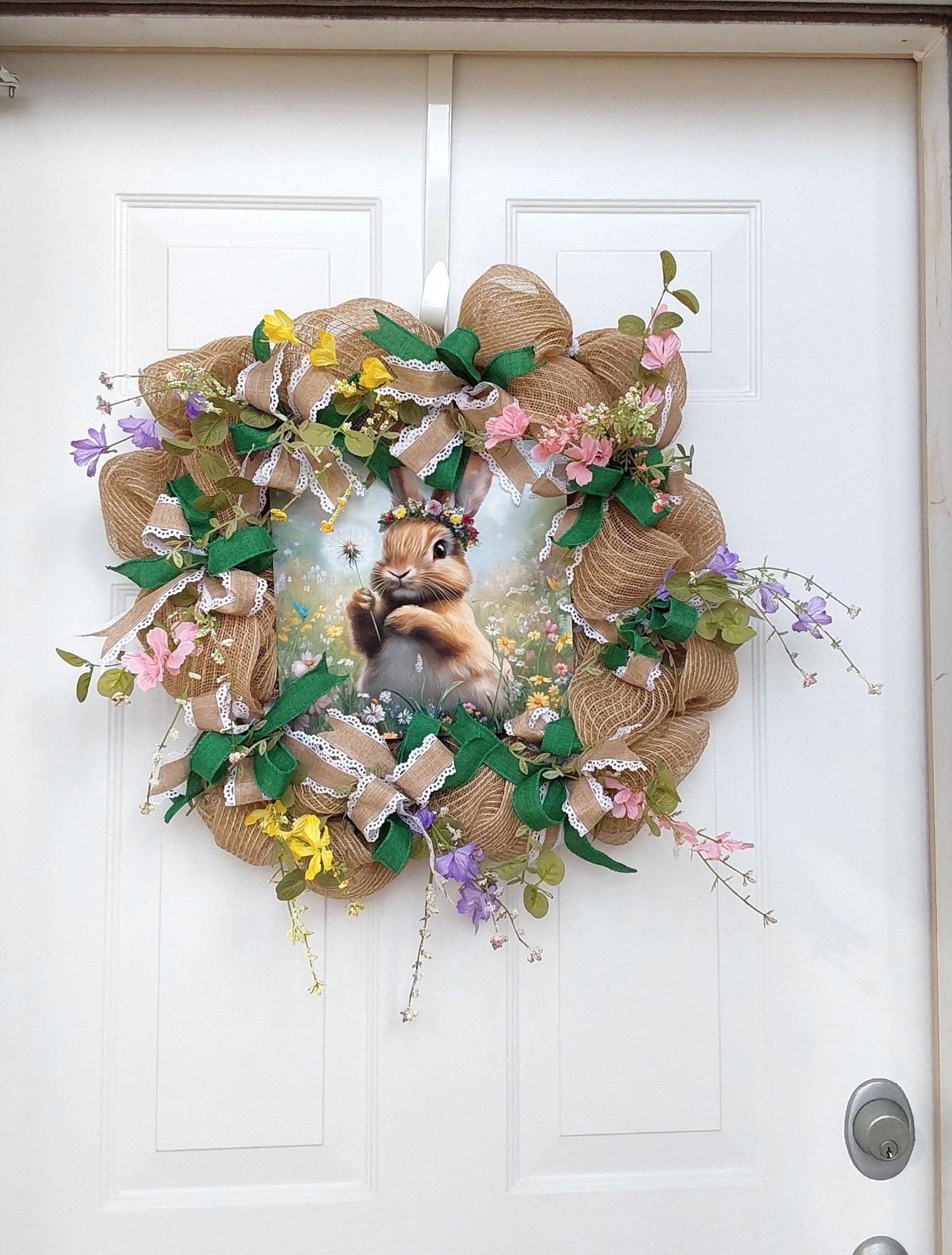Natural burlap mesh wreath with a bunny centerpiece.
